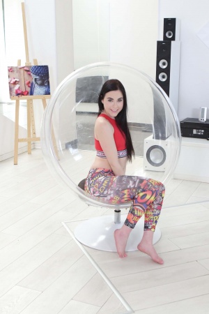 Amber Nevada is fucked in both of her tight holes in a transparent armchair