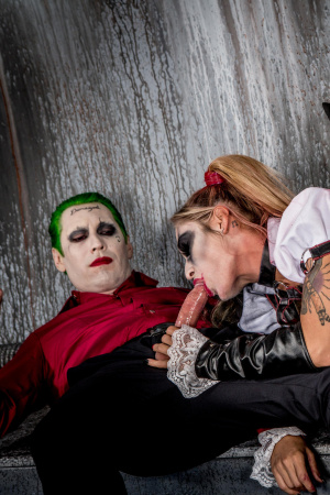 Superhero Kleio Valentien sandwiched between Joker and Batman