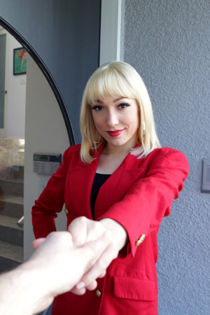 Platinum-blonde realtor Lily Labeau treats her client with vip services