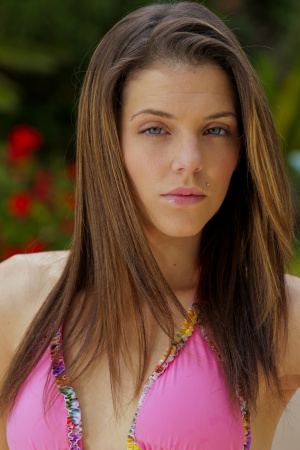 Young and charming Kiera Winters shows off her body