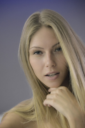 Slender and charming Angelica shows off her body