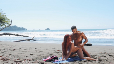 Red-headed Gala Brown moaning with pleasure during passionate sex on the beach