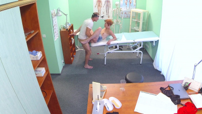Redhead receives a full pussy exam by doc